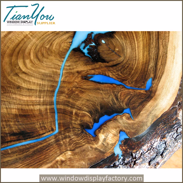 Live edge waterfall coffee table with glowing resin in the dark