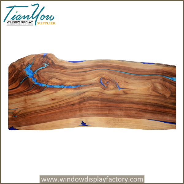 Live edge waterfall coffee table with glowing resin in the dark