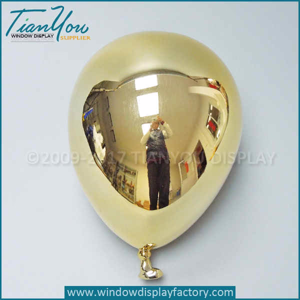 Electroplated gold balloon props