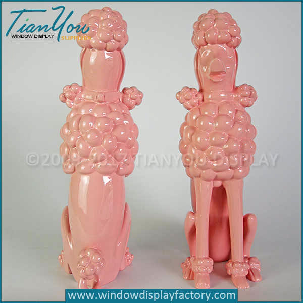 French poodle dog statues
