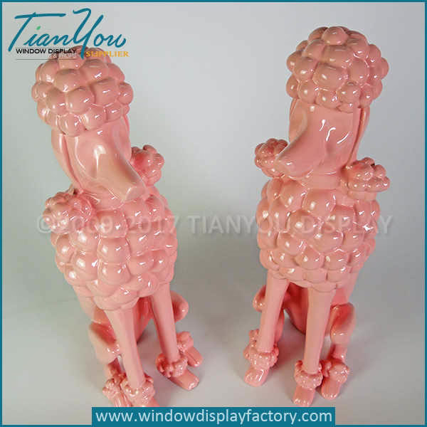 French poodle dog statues