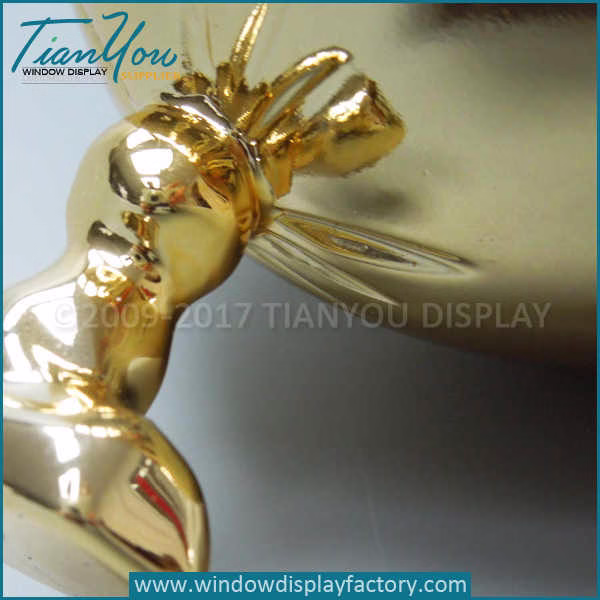Electroplated gold balloon props