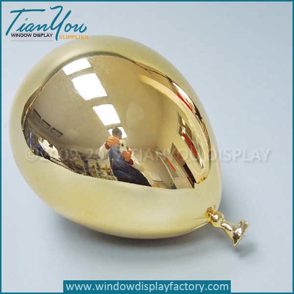 Electroplated gold balloon props